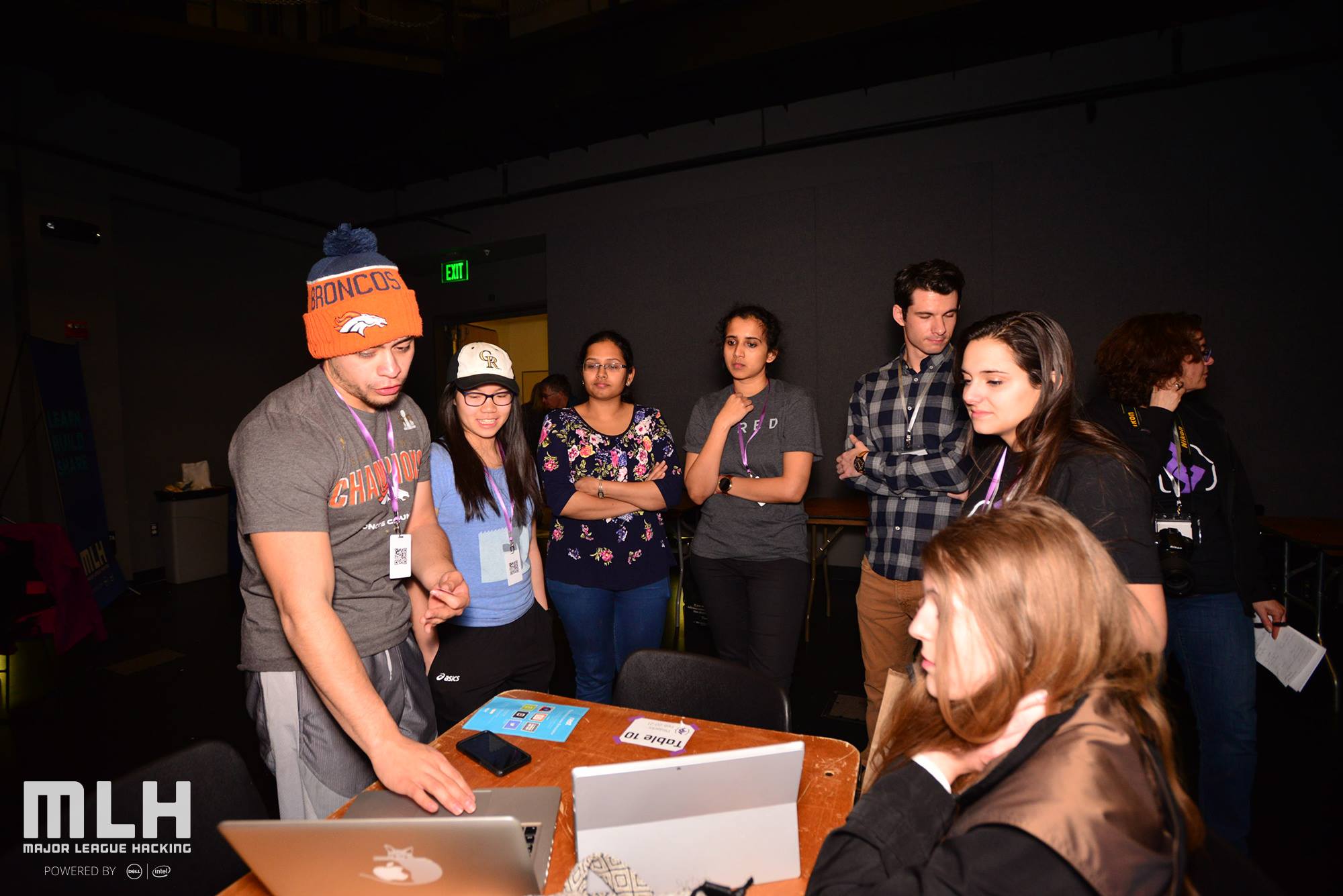Photos of T9Hackers demoing their projects.